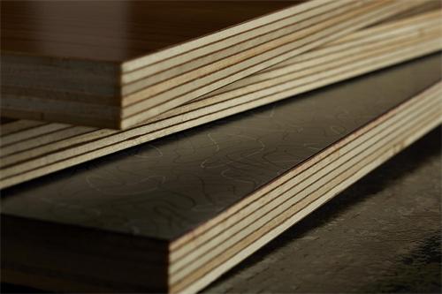 Cross-section view of stacked plywood sheets
