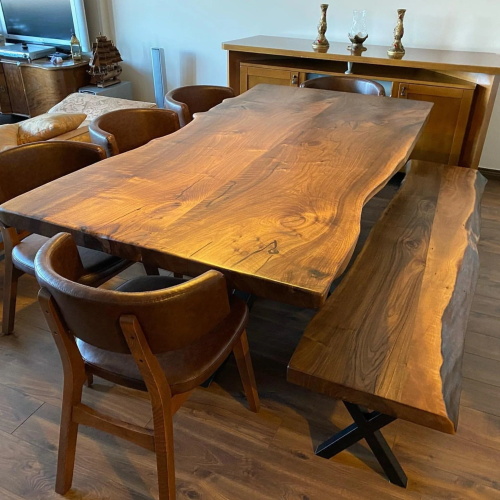 Live-edge solid wood dining table with matching bench