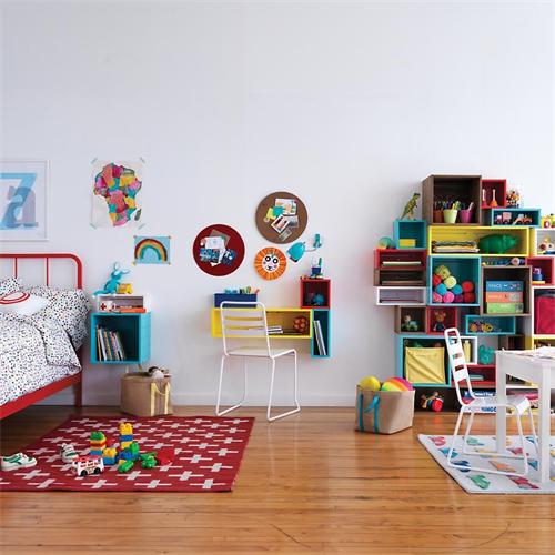 Colorful kids' room with modular cube shelves and bright accents